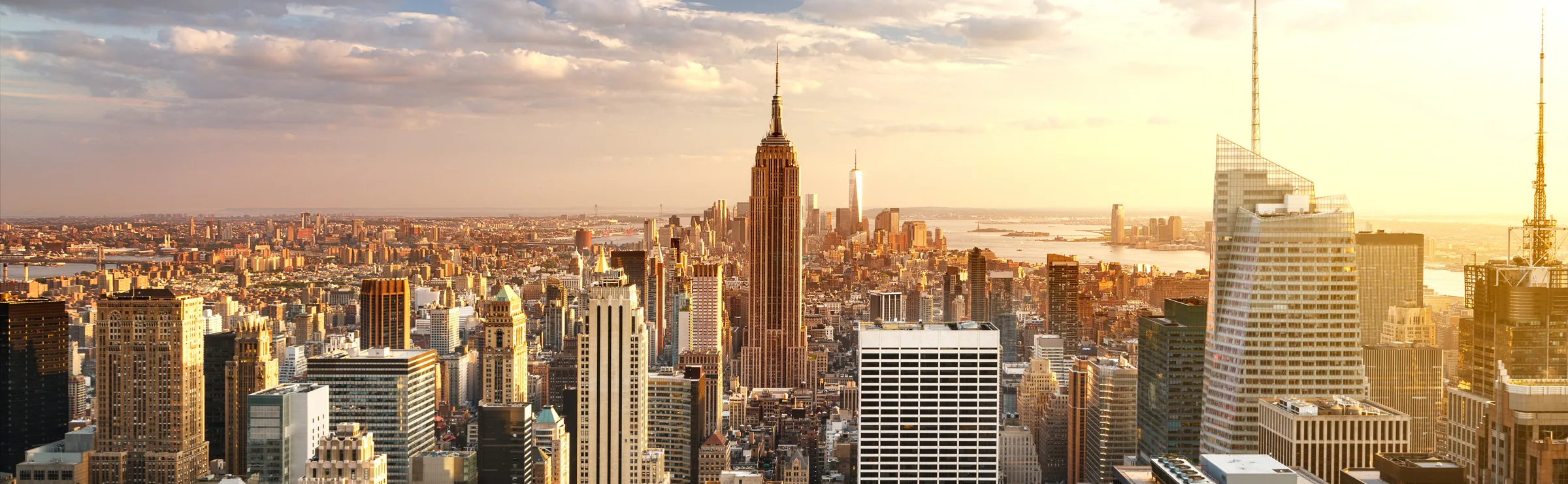 New York skyline at sunset, with the Empire State Building